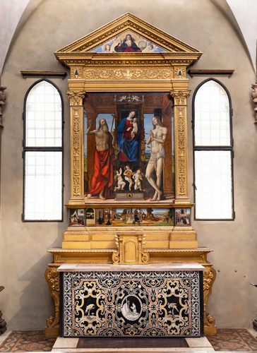 Miniatura Pala d'altare raffigurante la Madonna col Bambino in trono, affiancati da San Girolamo e San Sebastiano, opera di Francesco Bianchi Ferrari, 1506.